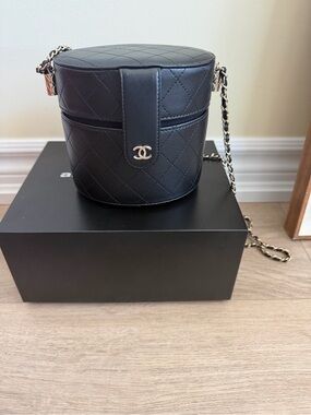 CHANEL Black Quilted Round Vanity Crossbody with Gold Chain